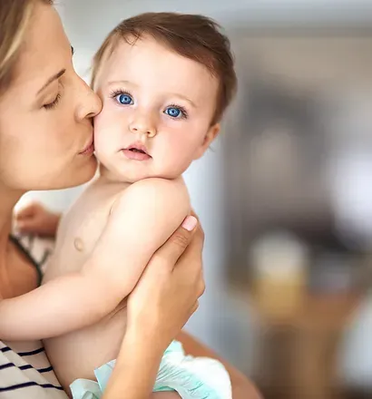 Mother holding her baby
