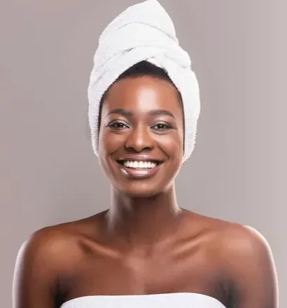 Smiling woman after her daily care routine